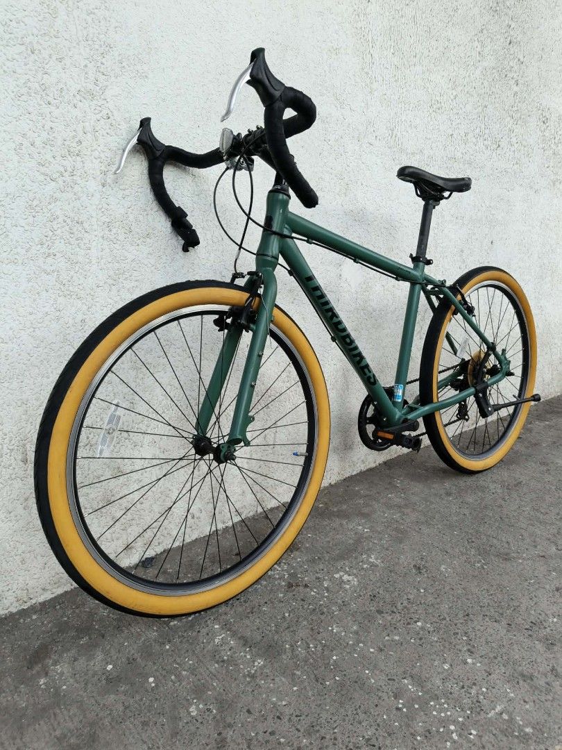 ThirdBikes Gravel/MTB 27.5 (Category: Bicycles) located in General Santos City (Dadiangas). Submitted by cclarimelvintageclassicretro (Listing ID 1469717743, Image 2). Description: - Brand: Third Bikes (City Commuter Road ,Gravel,Mtb 17" Seat Tube / 21" Top Tube ( 1 x 7 speed ) - Color: Green frame with striking yellow tires and black rims - Handlebars: Drop handlebars equipped with silver brake levers - Drivetrain: Single chainring setup up fron