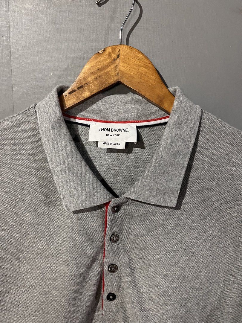 Thom Browne 4 bar Polo Shirt (Category: Luxury Apparel) located in San Mateo. Submitted by street_rev (Listing ID 1469689135, Image 2). Description: 27/29 x 21.