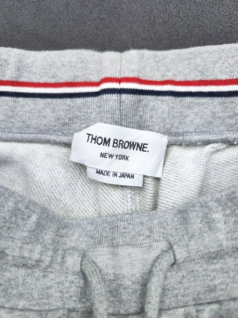 Thom Browne Cotton Shorts (Category: Luxury Apparel) located in Bulacan. Submitted by emilj23 (Listing ID 1469595015, Image 3). Description: Thom Browne Cotton Shorts Size 3 on tag L 22 W 32-36 Leg Hole 11 Condition 9.5/10 Color rate 9.5/10 Issue Cut Wash tag,Minimal Stain.