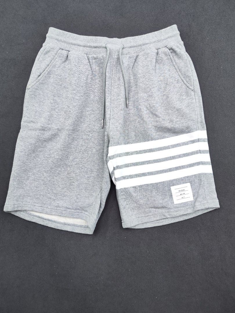Thom Browne Cotton Shorts (Category: Luxury Apparel) located in Bulacan. Submitted by emilj23 (Listing ID 1469595015, Image 1). Description: Thom Browne Cotton Shorts Size 3 on tag L 22 W 32-36 Leg Hole 11 Condition 9.5/10 Color rate 9.5/10 Issue Cut Wash tag,Minimal Stain.