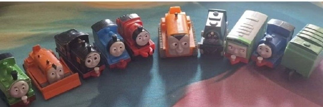 Thomas and Friends Mini Toy Trains Bundle (Category: Vehicle & Diecast Models) located in Arayat. Submitted by collectorboy143 (Listing ID 1469581441, Image 1). Description: - Set of 9 Thomas and Friends mini engines - Includes Thomas, James, Duck, and construction machinery characters - Durable plastic material - Perfect starter set for kids and collectors - Sold as a bundle only (no individual splitting).