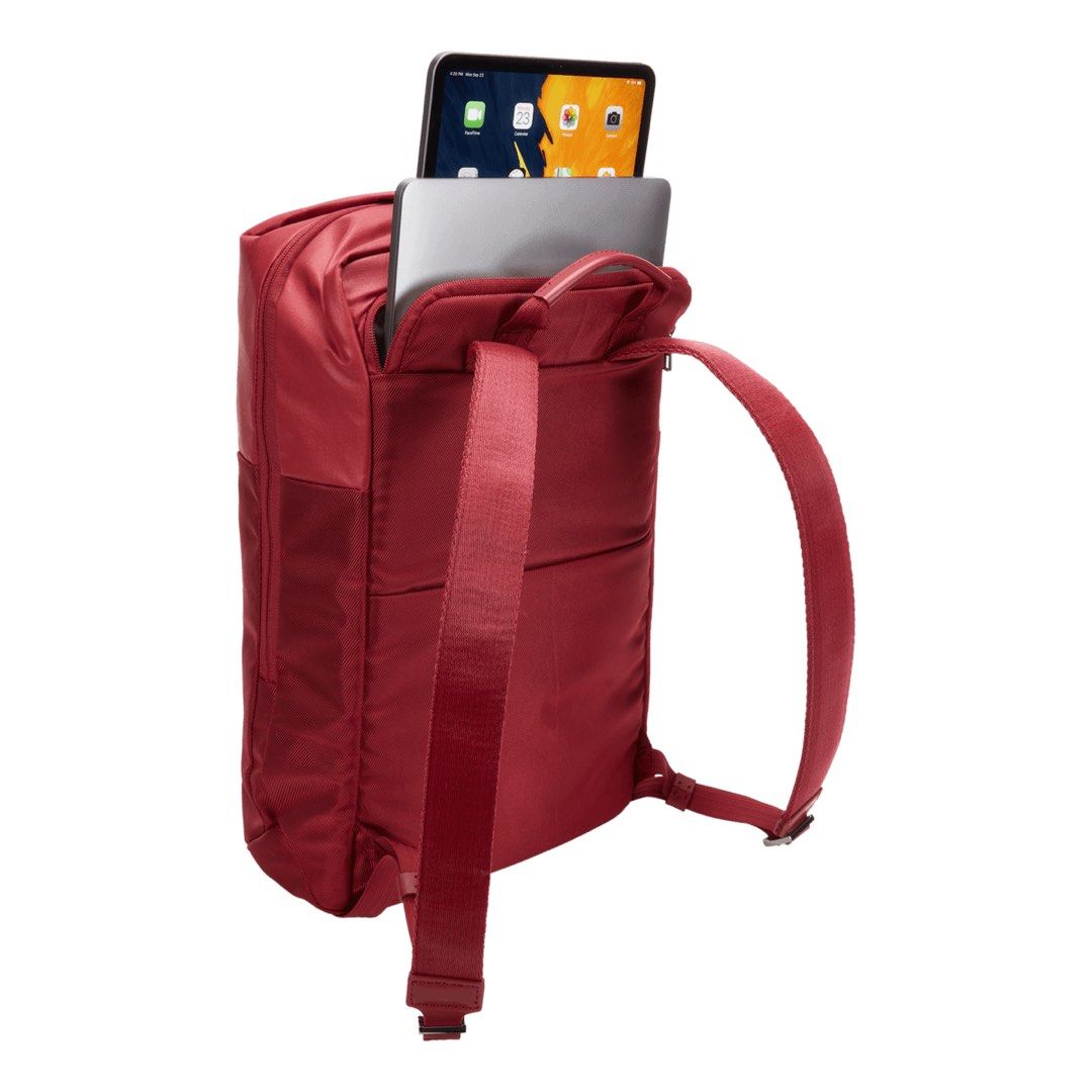 THULE SPIRA LAPTOP BACKPACK (RIO RED) (Category: Backpacks) located in Baguio. Submitted by chmlnstudios (Listing ID 1469690292, Image 3). Description: THULE SPIRA LAPTOP BACKPACK (RIO RED) CODE: C11-B09 A sleek, modern commuter laptop backpack designed with Swedish utility and outdoor performance. Featuring dedicated padded sleeves for your laptop and tablet, a wide-mouth main compartment, and metal protective feet, this rich Rio Red pack blends