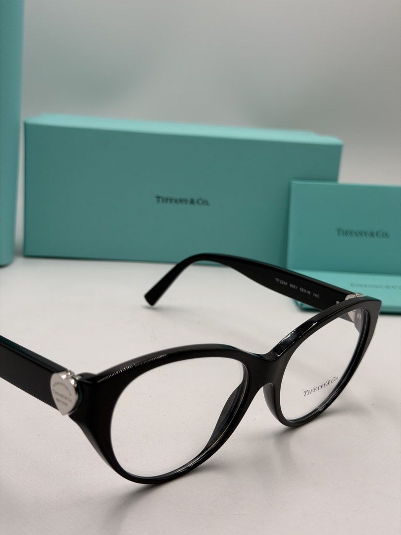 Tiffany & Co. TF2244 Eyeglasses (Color Code: 8001 / Black) (Category: Luxury Accessories) located in Lipa City. Submitted by _cmluxephilippines (Listing ID 1469579477, Image 3). Description: Tiffany & Co. TF2244 Eyeglasses (Color Code: 8001 / Black) • Brand: Tiffany & Co. • Model Number: TF2244 / TF2244F • Color Code: 8001 (Shiny Black Frame) • Frame Material: Premium Italian Acetate • Shape: Cat-Eye / Rounded Phantos • Features: Signature silver