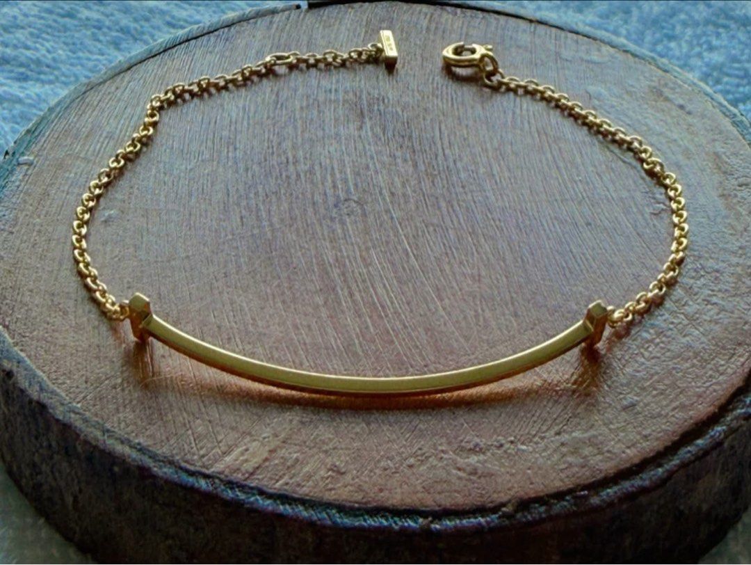 Tiffany Bracelet (Category: Luxury Accessories) located in Quezon City. Submitted by liezl.marie (Listing ID 1469750906, Image 1). Description: Authentic T!ff@ny T Smile Bracelet in 18k Yellow Gold. 36,500 Open for layaway. Disclaimer: We are not affiliated, associated, authorized, endorsed by or in any way officially connected with any other company or luxury brand. All copyrights are reserved to the original brand..