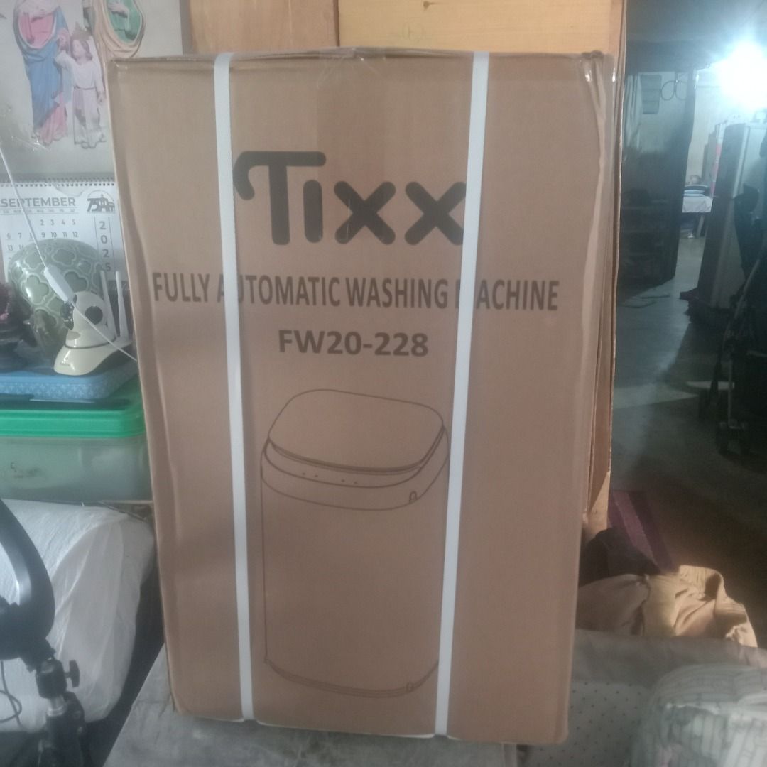 Tixx Fully Automatic Washing Machine FW20-228 (Category: Washing Machines and Dryers) located in Manila. Submitted by louiebox05 (Listing ID 1469619556, Image 1). Description: - Brand: Tixx Fully Automatic Washing Machine - Model: FW20-228 - Condition: Brand new, unopened in original shipping box with straps still wrapped - Ideal For: Compact spaces and small laundry loads - Setup: Simple plug-and-play installation - Note: Box has standard handli