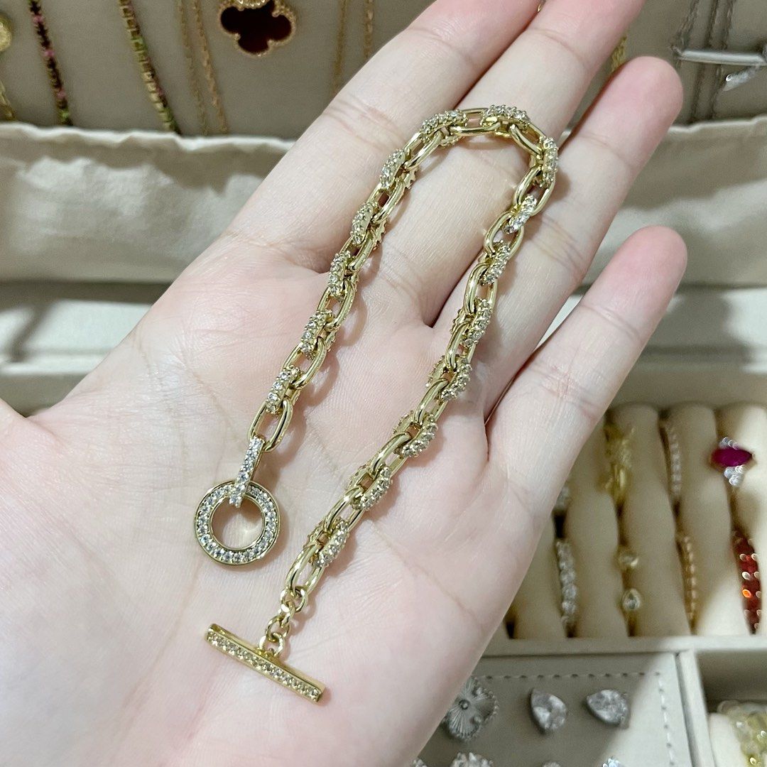 T-LOCK GOLD BRACELET (Category: Bracelets) located in Talavera. Submitted by curatedbykhy (Listing ID 1469689612, Image 1). Description: so shiny!! puno ng stones!! light gold color.