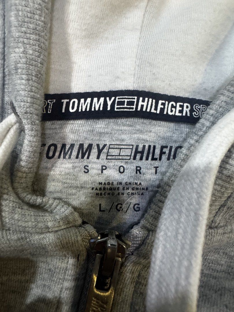 tommy hilfiger grey jacket (Category: Coats, Jackets and Outerwear) located in Manila. Submitted by angelrotting (Listing ID 1469693283, Image 2). Description: unisex, has small blue stain on left sleeve.