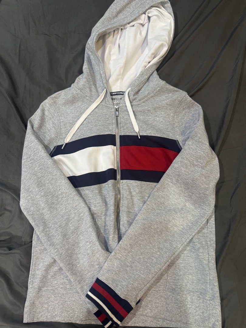 tommy hilfiger grey jacket (Category: Coats, Jackets and Outerwear) located in Manila. Submitted by angelrotting (Listing ID 1469693283, Image 1). Description: unisex, has small blue stain on left sleeve.