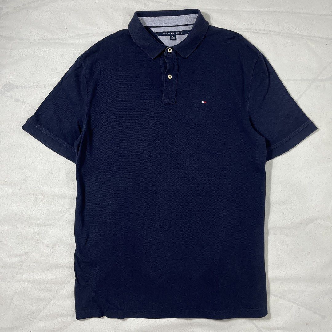 Tommy Hilfiger Navy Poloshirt (Category: Tshirts & Polo Shirts ) located in Nasugbu. Submitted by janstuffs.ph (Listing ID 1469744553, Image 1). Description: Tommy Hilfiger Navy Blue Poloshirt 💯Legit! Size: XLarge Width: 22" Length: 30" Condition: 9.5/10 Excellent Flaw: NONE Mine: 680.