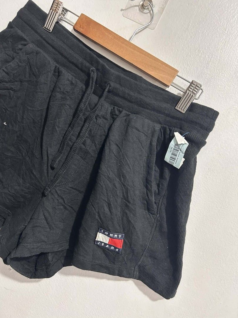 Tommy Jeans Black Drawstring Shorts Size (Category: Shorts) located in Rizal. Submitted by thrift_finds_739 (Listing ID 1469674675, Image 3). Description: NO ISSUE Excellent Condition Size: Small Petite Color rate :9/10 Length: 12 Leg Opening: 13.