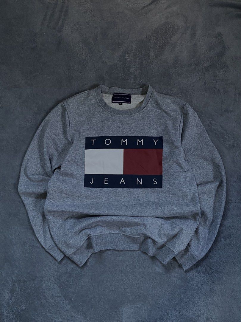 Tommy Sweater (Category: Coats, Jackets and Outerwear) located in Manila. Submitted by fitmitless.fl (Listing ID 1469722498, Image 1). Description: width: 22-23 length: 25 color rate:10/10 condition:10/10 Issue: n/a.