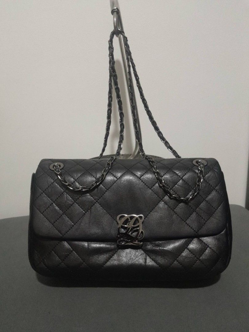 Tory Burch (sling is missing) and Louis Quatorze (Category: Tote Bags) located in Quezon City. Submitted by sophiaokc41154 (Listing ID 1469648792, Image 3). Description: RFS: Decluttering Personal Prelove Tory Burch (sling is missing) and Louis Quatorze Original bags Needs cleaning, No damage Buy both for only 1,750k No haggling Sold for a very low price.