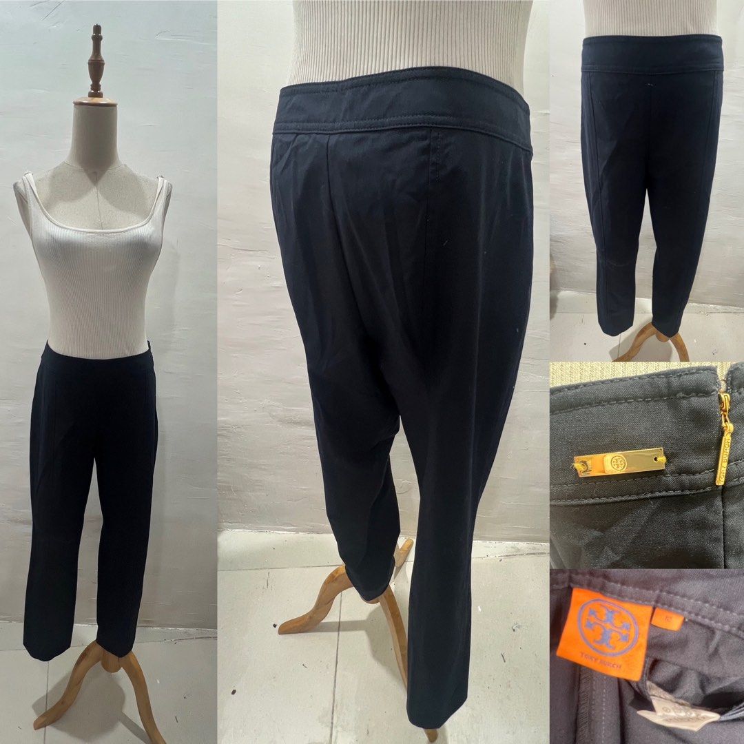 Tory Burch Black Trousers Pants Size 12 (Category: Jeans) located in Bacolod City. Submitted by bhabissagal-05763 (Listing ID 1469707505, Image 1). Description: - Brand: Tory Burch - Color: Classic Black - Cut: Straight leg with tailored front seams - Details: Gold metal branding plate near side zipper pocket - Interior: Orange tag with brand and size details - Condition: Clean fabric, excellent overall condition - Style: Great staple piece for w
