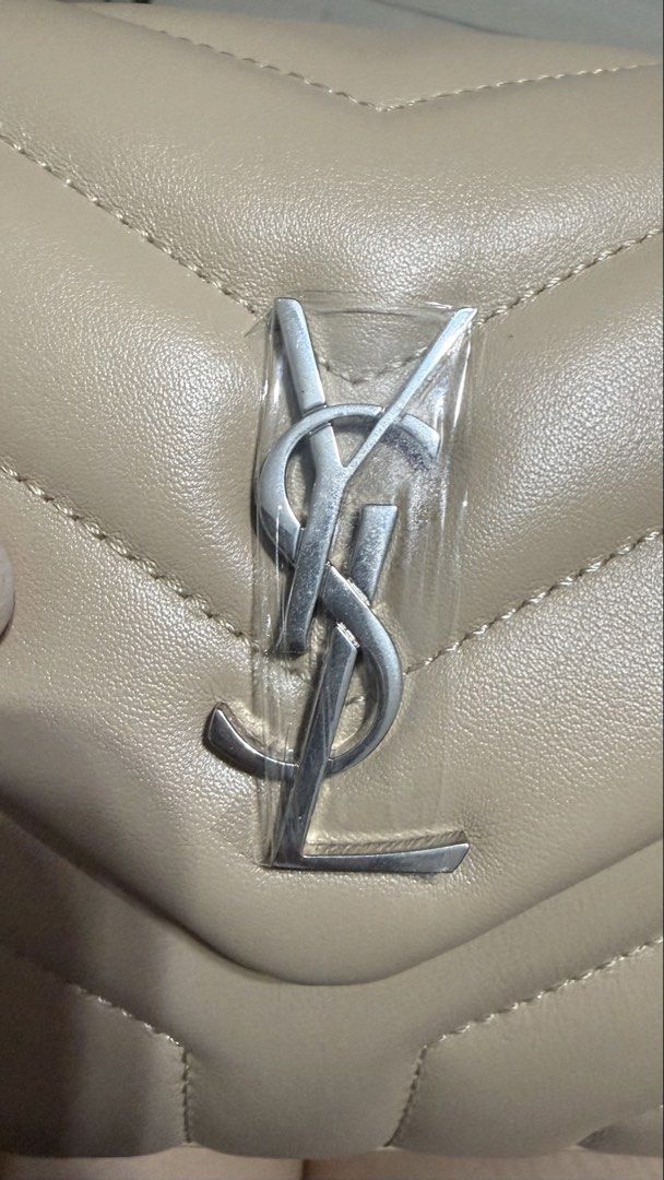 Toy loulou in beige (Category: Cross-body Bags) located in Las Pinas. Submitted by misspurser (Listing ID 1469705204, Image 2). Description: Guarranteed genuine leather Toy loulou beige in silver hardware.