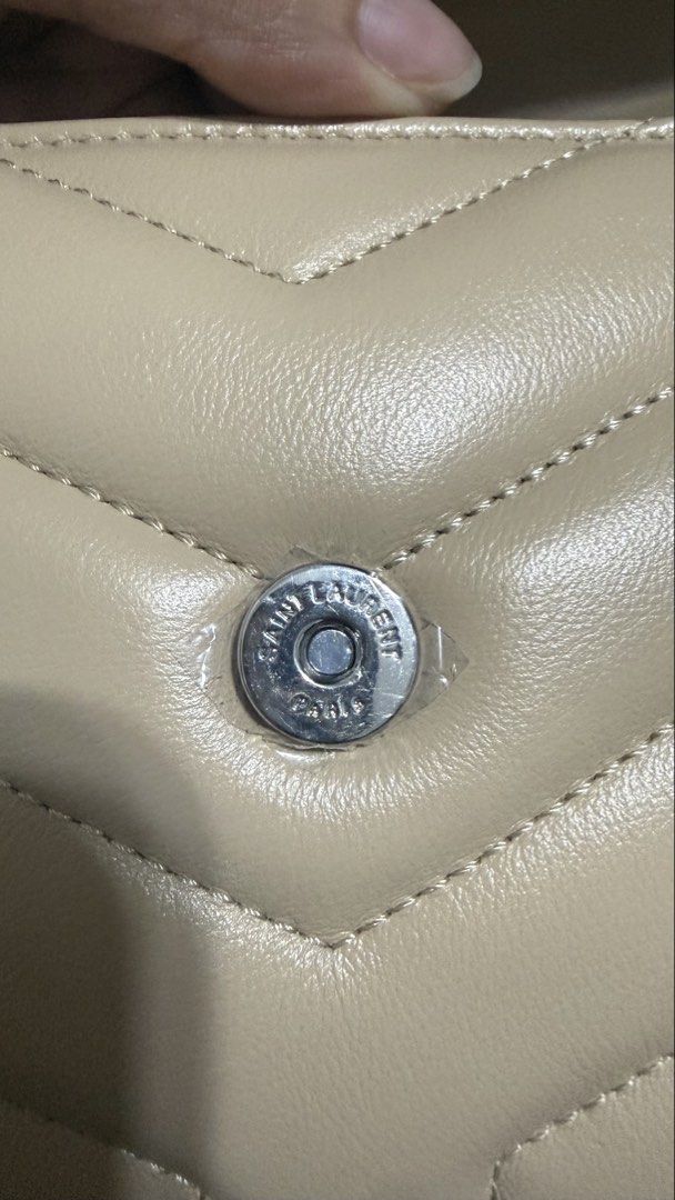 Toy loulou in beige (Category: Cross-body Bags) located in Las Pinas. Submitted by misspurser (Listing ID 1469705204, Image 3). Description: Guarranteed genuine leather Toy loulou beige in silver hardware.
