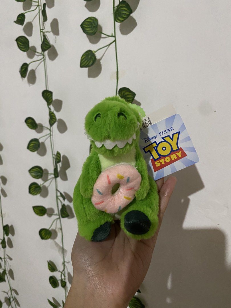 Toy story Rex Plush Charm (Category: Plushies & Soft Toys) located in Guagua. Submitted by toy_corner (Listing ID 1469675572, Image 1). Description: No issue Brand new Pampanga loc Mop: Gcash J&T courier.