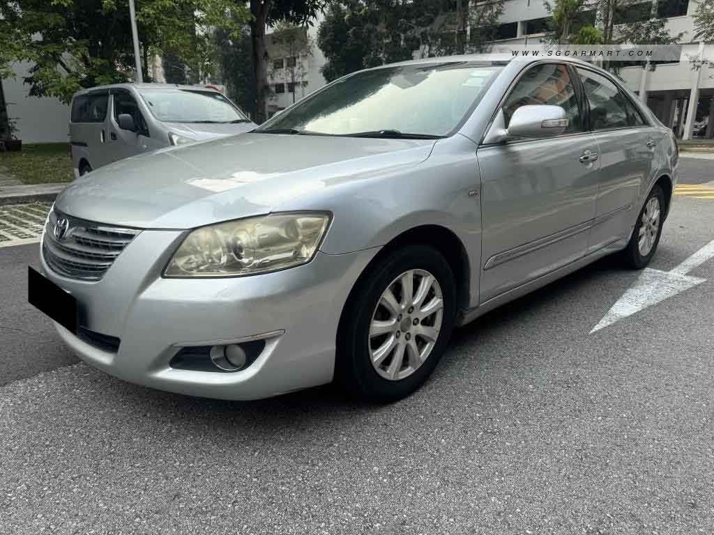 Toyota Camry 2.0 (A) (Category: Used Cars) located in Singapore. Submitted by pa2202 (Listing ID 1469588676, Image 1). Description: 2nd owner. Good condition for bullet-proof engine and gearbox, well known luxurious Camry. Perfect ride for long term drive with comfortable legroom space. Rear aircon for the extra cool air. Lower ownership count. Original paintwork, original leather seats. Road tax just paid, covers until Mar 2027..