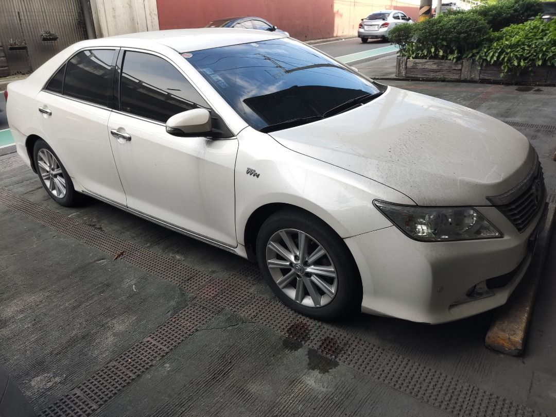 Toyota Camry 2.5 (A) (Category: Used Cars) located in Quezon City. Submitted by duckid (Listing ID 1469684162, Image 1). Description: 2013 TOYOTA CAMRY 2.5V – LOW MILEAGE Selling our 2013 Toyota Camry 2.5V with only 25,194 km on the odometer! Well-preserved executive sedan with original paint and no body repairs or repainting. Spacious, comfortable, and ideal for family or executive use. ✅ 2.5L gasoline engine ✅ Only 25,194 km mileage ✅ Mostly or