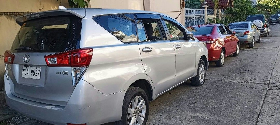 Toyota Innova (Category: Used Cars) located in Caloocan City. Submitted by redribbonarmy041980 (Listing ID 1469590350, Image 2). Description: 2019 Toyota Innova e matic diesel issue: me lukot s headlight frame pero hndi pumotok airbag at kmpleto conduction sticker at original mga salamin.repainted, desente nman unit. bago battery bagong change oil bago rack end bago brake pads bagong rehstro cold aircon 7 seater michellin tires walng kalampag COM