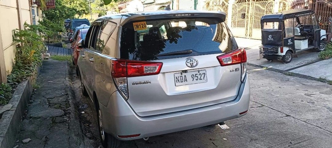Toyota Innova (Category: Used Cars) located in Caloocan City. Submitted by redribbonarmy041980 (Listing ID 1469590350, Image 3). Description: 2019 Toyota Innova e matic diesel issue: me lukot s headlight frame pero hndi pumotok airbag at kmpleto conduction sticker at original mga salamin.repainted, desente nman unit. bago battery bagong change oil bago rack end bago brake pads bagong rehstro cold aircon 7 seater michellin tires walng kalampag COM