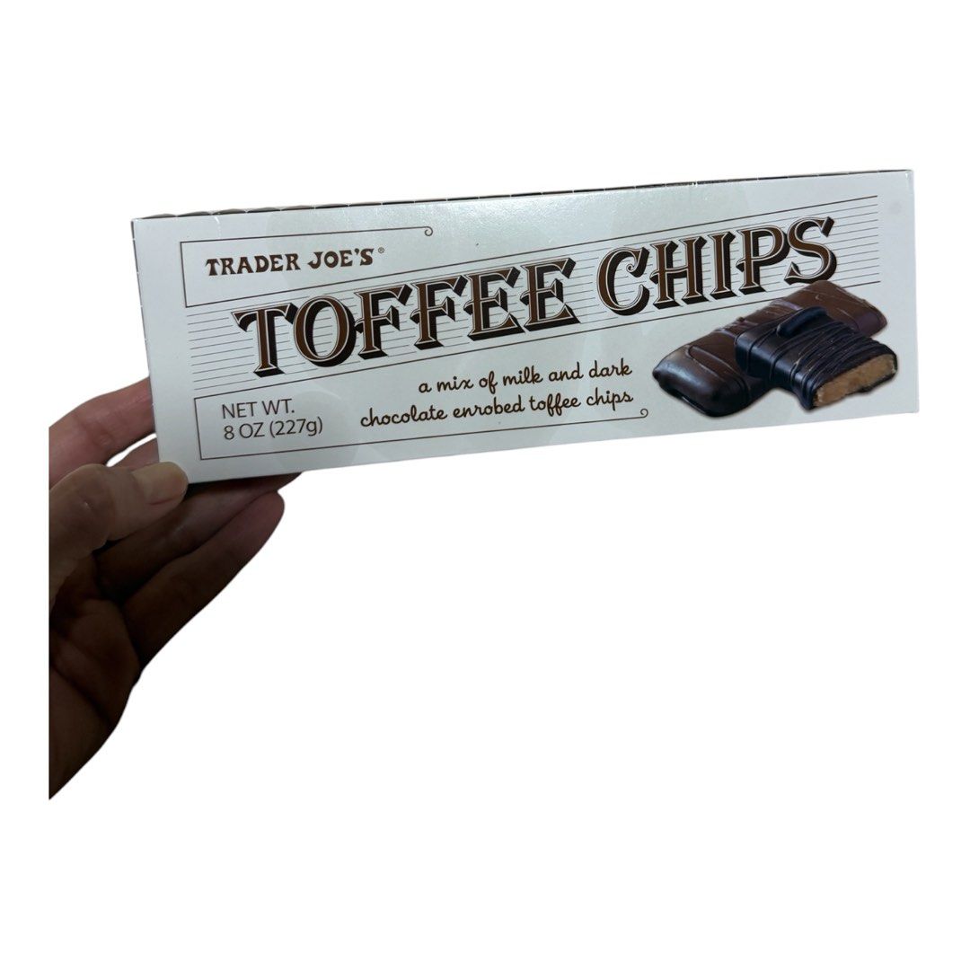 Trader Joe’s Toffee Chips (Category: Other Food & Drinks) located in Lipa City. Submitted by lifestyled (Listing ID 1469648653, Image 1). Description: Trader Joe’s Toffee Chips, which features a mix of buttery, crunchy toffee pieces enrobed in smooth milk chocolate and dark chocolate. Expiry 5/2027 💯 Authentic.
