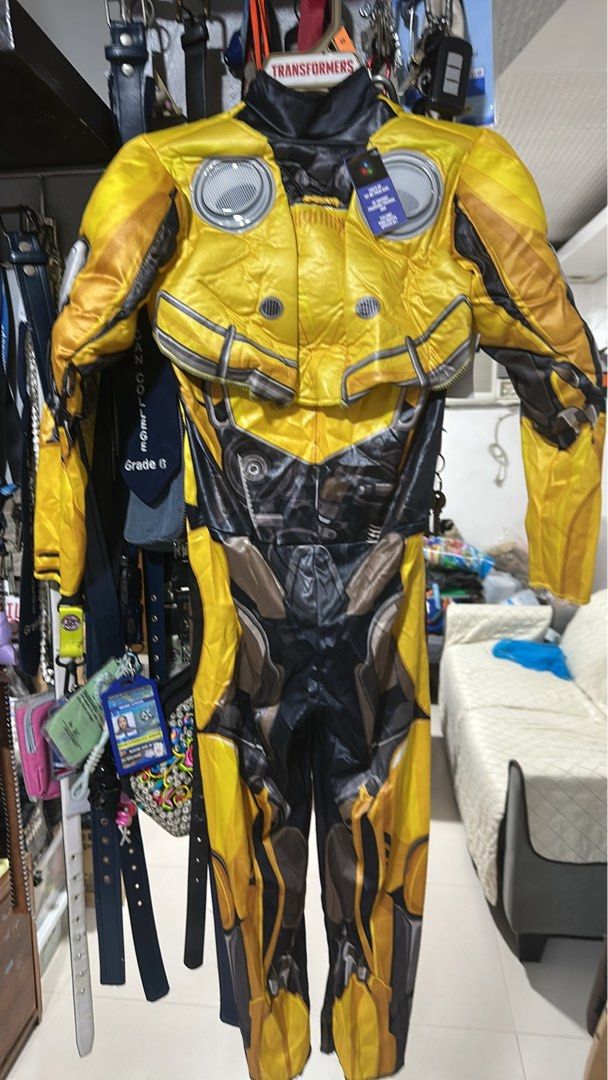 Transformers Bumblebee Costume Size M 8-10 (Category: Babies & Kids Fashion) located in Quezon City. Submitted by breakstuf50 (Listing ID 1469733102, Image 1). Description: - Transformers Bumblebee costume for kids - Size: Medium (8-10) - Features a light-up chest with an active try-me button - Detailed mechanical robot prints on front and back - Padded chest pieces for an authentic armor look - Perfect for parties, Halloween, and dress-up fun.