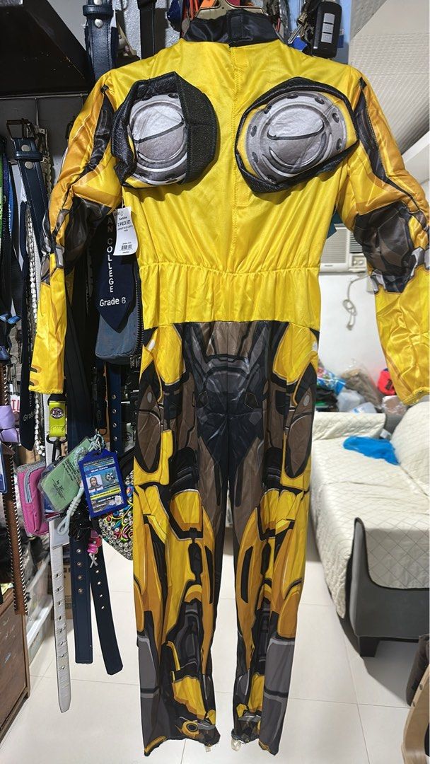 Transformers Bumblebee Costume Size M 8-10 (Category: Babies & Kids Fashion) located in Quezon City. Submitted by breakstuf50 (Listing ID 1469733102, Image 2). Description: - Transformers Bumblebee costume for kids - Size: Medium (8-10) - Features a light-up chest with an active try-me button - Detailed mechanical robot prints on front and back - Padded chest pieces for an authentic armor look - Perfect for parties, Halloween, and dress-up fun.