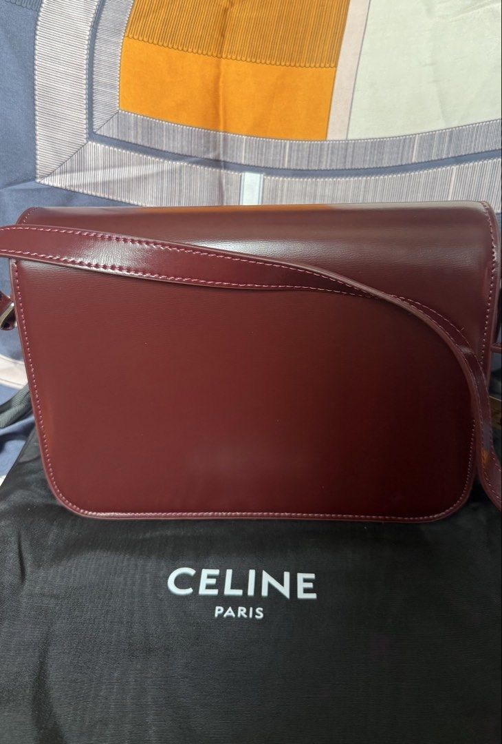 Triomphe body bag in oxblood (Category: Cross-body Bags) located in Las Pinas. Submitted by misspurser (Listing ID 1469705506, Image 2). Description: Guarranteed genuine leather Silver hardware Comes with dustbag.
