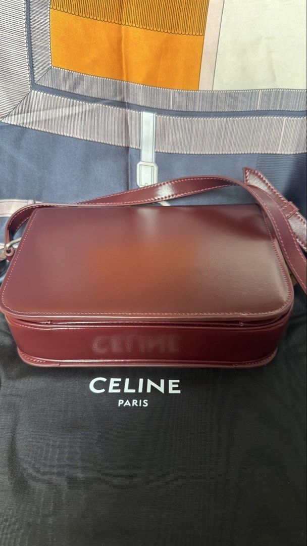 Triomphe body bag in oxblood (Category: Cross-body Bags) located in Las Pinas. Submitted by misspurser (Listing ID 1469705506, Image 3). Description: Guarranteed genuine leather Silver hardware Comes with dustbag.