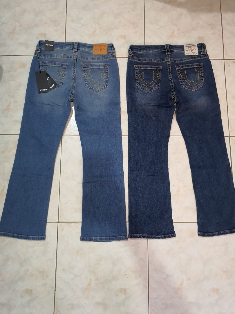 True religion boot cut jeans (Category: Jeans) located in Caloocan City. Submitted by cleverwind_1e53ab (Listing ID 1469637996, Image 2). Description: - Brand: True Religion - Style: Boot cut jeans - Colors: Light blue and dark blue wash - Size: 30 (Waist: 76cm, Hips: 97cm) - Material: 98% Cotton, 2% Polyurethane for slight stretch - Condition: Brand new with tags (BNWT) - Origin: Made in Vietnam - Features: Classic back pocket stitching and bran