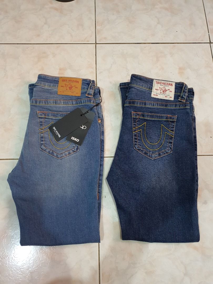 True religion boot cut jeans (Category: Jeans) located in Caloocan City. Submitted by cleverwind_1e53ab (Listing ID 1469637996, Image 1). Description: - Brand: True Religion - Style: Boot cut jeans - Colors: Light blue and dark blue wash - Size: 30 (Waist: 76cm, Hips: 97cm) - Material: 98% Cotton, 2% Polyurethane for slight stretch - Condition: Brand new with tags (BNWT) - Origin: Made in Vietnam - Features: Classic back pocket stitching and bran