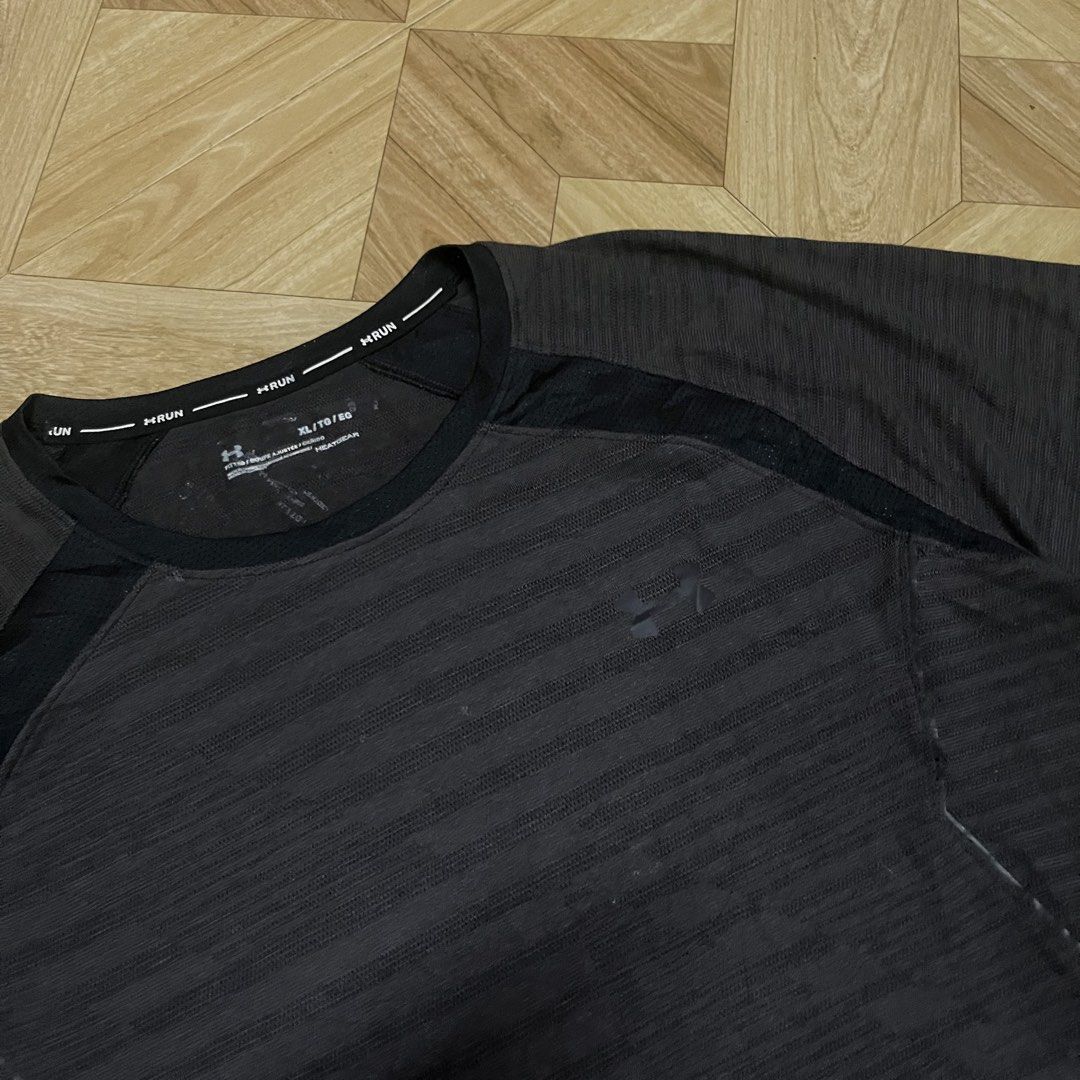 Under Armour Compression shirt (Category: Activewear) located in Cavite. Submitted by sacmaestro444 (Listing ID 1469691081, Image 2). Description: XL on tag 24x27 print good condition overall good condition.