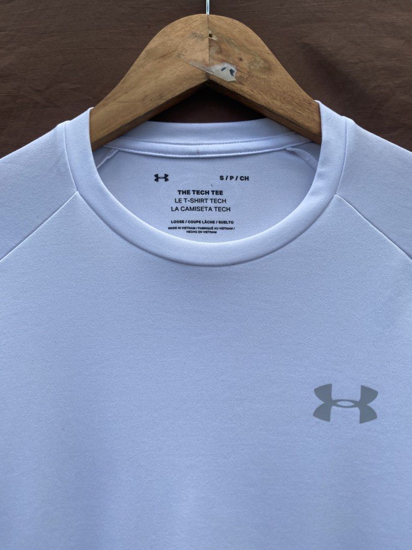 UNDER ARMOUR DRY FIT SHIRT WHITE (Category: Tshirts & Polo Shirts ) located in Antipolo. Submitted by treasurethings02 (Listing ID 1469650014, Image 2). Description: UNDER ARMOUR DRY FIT SHIRT EXCELLENT TO ASNEW CONDITION 10/10 CR DIMENSIONS 22W/28L STRETCHABLE MATERIAL GANDA NETO SOBRA DETAILS PHOTO🫶🏻.