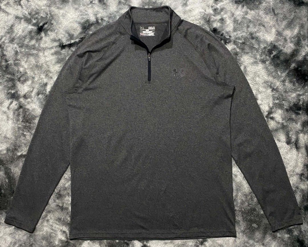 Under Armour HeatGear 1/4 Zip Pullover Grey (Category: Coats, Jackets and Outerwear) located in Sorsogon. Submitted by johnmichae69459 (Listing ID 1469754471, Image 1). Description: - Brand: Under Armour - Style: Loose fit 1/4 zip pullover - Size: MD/M - 22 width - 28 lenght - Color: Grey with black front zipper - Tech: HeatGear material inside the collar for comfort - Details: Small UA logo on chest, oval UA graphic near hem - Condition: Clean, 