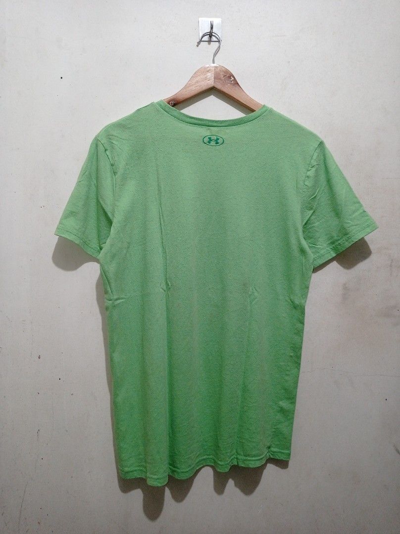 Under Armour "never back down" (Category: Tshirts & Polo Shirts ) located in Pasig City. Submitted by pureselectionapparel (Listing ID 1469748921, Image 2). Description: Under Armour "never back down" 🏷️ Size med-large Dimes: 21width 28.5length Very Good Condition Issue: Fine lints 300 plus ship Location: Pasig City.