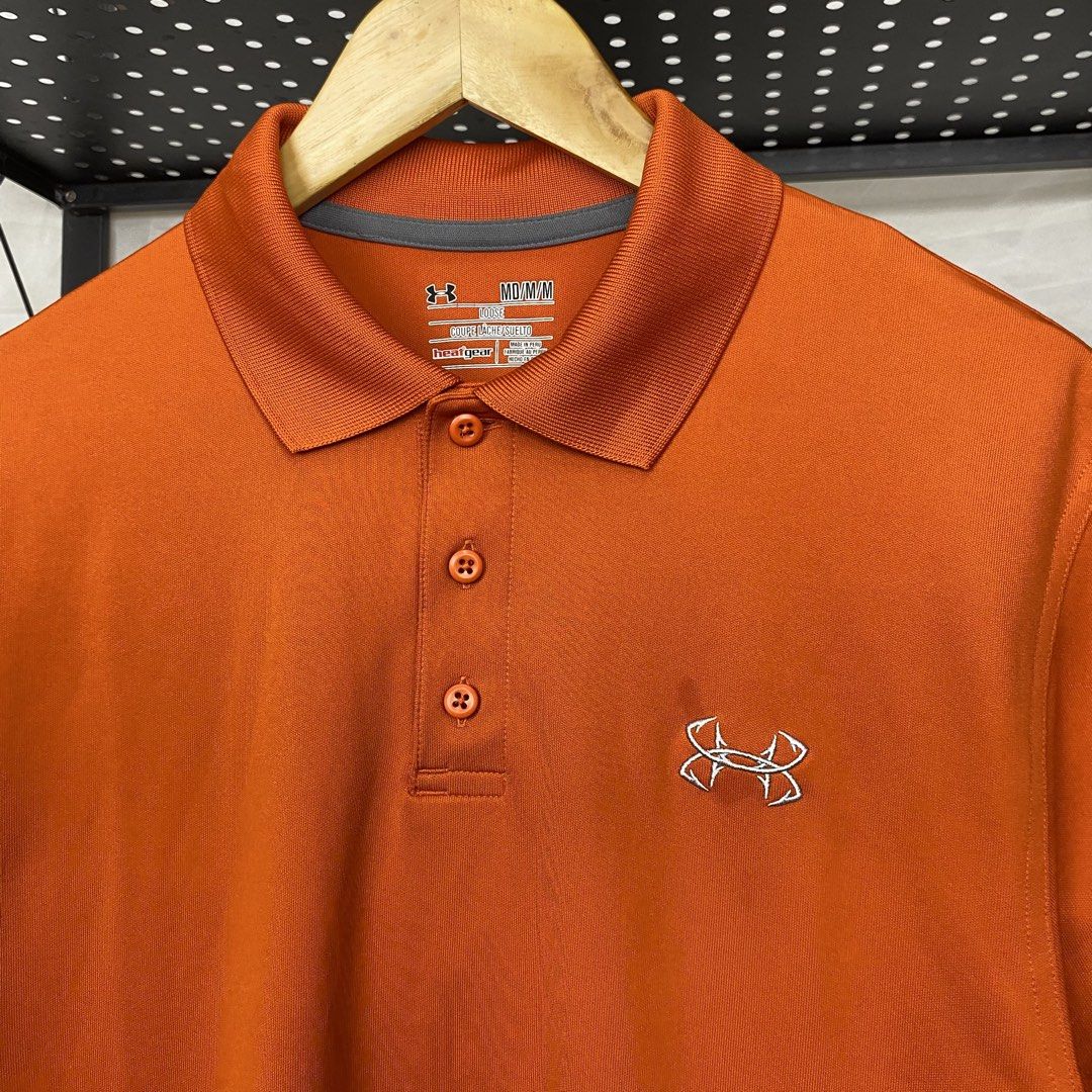 Under Armour Performance Poloshirt (Category: Tshirts & Polo Shirts ) located in Cebu City. Submitted by cebuvntgvibes (Listing ID 1469668509, Image 2). Description: 21W x 29L (M-L) . Good as new condition. Nice orange colorway. Embroidered details. No issue. . Mine ₱1,300+sf.