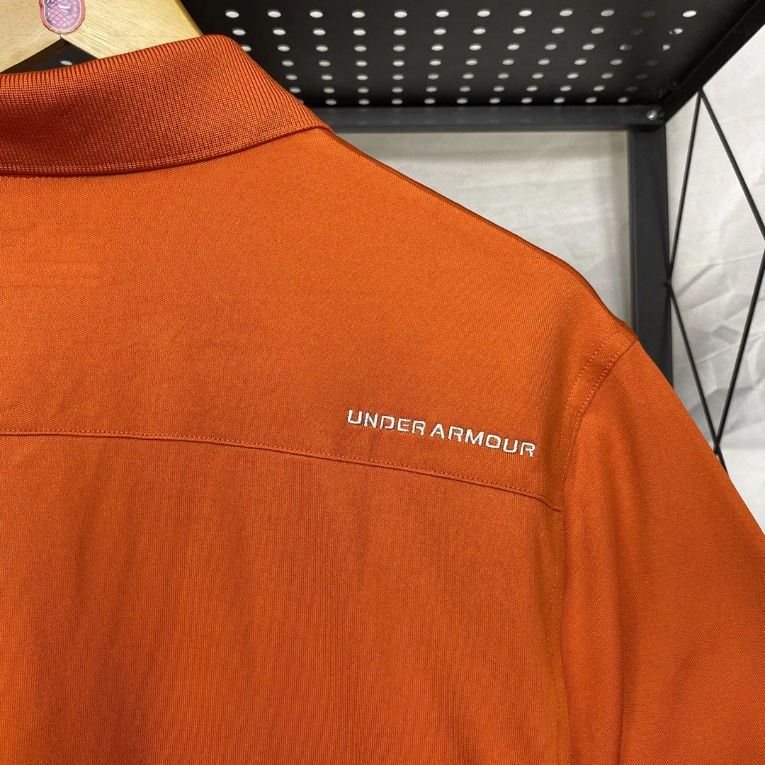 Under Armour Performance Poloshirt (Category: Tshirts & Polo Shirts ) located in Cebu City. Submitted by cebuvntgvibes (Listing ID 1469668509, Image 3). Description: 21W x 29L (M-L) . Good as new condition. Nice orange colorway. Embroidered details. No issue. . Mine ₱1,300+sf.