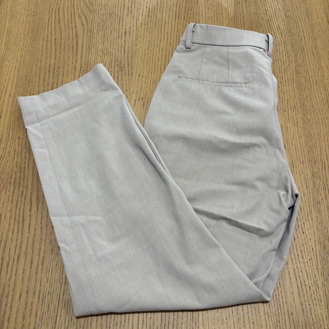 Uniqlo Ankle Pants Beige Size S (Category: Other Bottoms) located in Legazpi City. Submitted by loisfinds (Listing ID 1469628261, Image 2). Description: - Brand: Uniqlo - Item: Smart Pants - Color: Beige - Size: S (Waist: 60-66cm | Hip: 85-91cm) - Material: Polyester, rayon, and spandex blend - Condition: Wearable with a small dirt mark near the front thigh area - Perfect for casual or office wear - As is Rfs: upsizing .