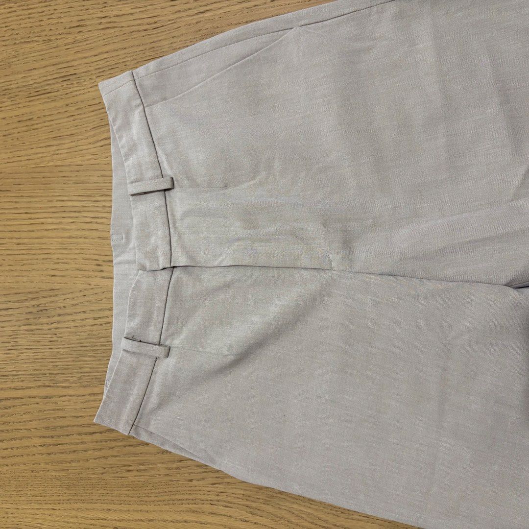 Uniqlo Ankle Pants Beige Size S (Category: Other Bottoms) located in Legazpi City. Submitted by loisfinds (Listing ID 1469628261, Image 3). Description: - Brand: Uniqlo - Item: Smart Pants - Color: Beige - Size: S (Waist: 60-66cm | Hip: 85-91cm) - Material: Polyester, rayon, and spandex blend - Condition: Wearable with a small dirt mark near the front thigh area - Perfect for casual or office wear - As is Rfs: upsizing .