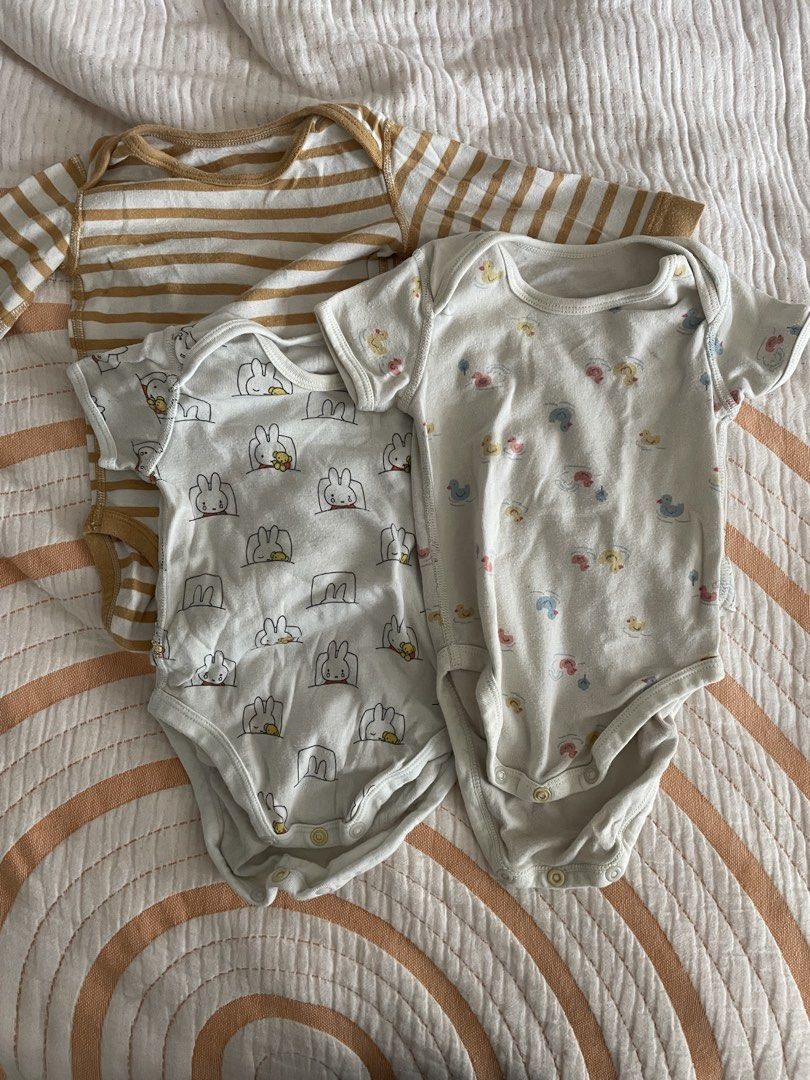 Uniqlo Baby Bodysuits Bundle (size 70) (Category: Babies & Kids Fashion) located in Pasig City. Submitted by ourpreloved.shop (Listing ID 1469599946, Image 1). Description: - Value bundle: Set of 3 adorable baby bodysuits Size 70 / 3-6 months - Convenient: Snap buttons at the bottom for quick and hassle-free diaper changes - Comfort: Crafted from soft, breathable cotton ideal for daily infant wear.