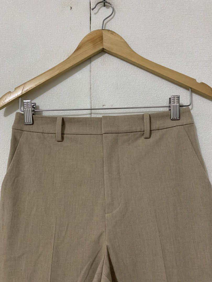 Uniqlo beige smart ankle length pants (Category: Other Bottoms) located in Calamba. Submitted by melaicas (Listing ID 1469676446, Image 3). Description: Waist-26/28 inches Length-36 inches .