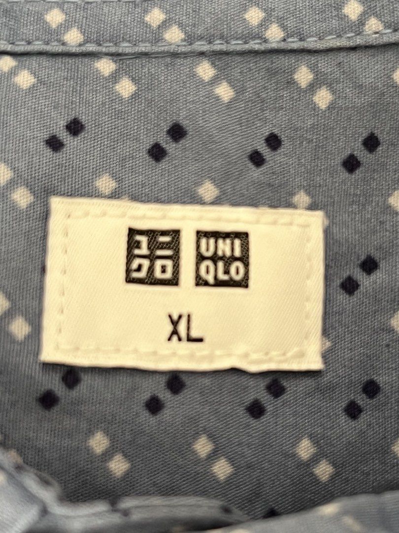 Uniqlo Blue Geometric Pattern Button Up Shirt XL (Category: Tshirts & Polo Shirts ) located in Muntinlupa City. Submitted by 09leah77 (Listing ID 1469602691, Image 2). Description: - Brand: Uniqlo - Color: Soft blue with all-over geometric diamond pattern - Size: XL - Features: Standard collar, front button placket, single left chest pocket - Style: Casual, great for everyday wear - Condition: Excellent.