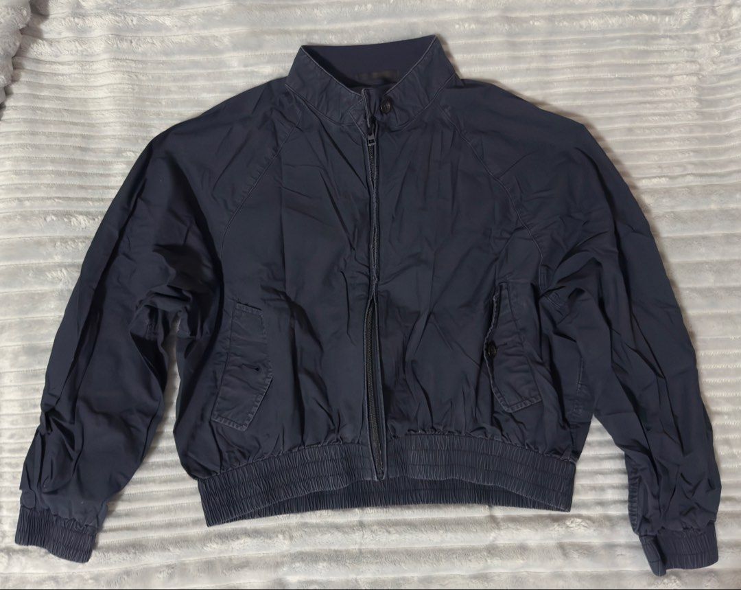 UNIQLO Cropped Harrington Jacket (Category: Coats, Jackets and Outerwear) located in San Juan City. Submitted by thearchersarchive (Listing ID 1469667360, Image 1). Description: Size: Small (Cropped length/Short-cut jacket) Color: Dark Navy Blue / Faded Slate Navy Condition: Well Used (Has visible signs of wear/wash fade giving it a nice vintage/archive look, but fully functional with no major tears). MOP: Bank transfer/Gcash Delivery: Grab/Lalam