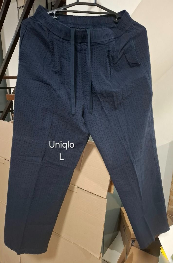 UNIQLO Navy Textured Drawstring Pants (Category: Other Bottoms) located in Pasig City. Submitted by dripcounty (Listing ID 1469688284, Image 1). Description: UNIQLO Navy Textured Drawstring Pants ₱250 Bought in the Philippines Size: Large Condition: Good / preloved Navy textured drawstring pants with cropped leg length. Actual item shown in photos. Delivery fee shouldered by buyer (Lalamove / other courier). Item price excludes delivery. Payment 