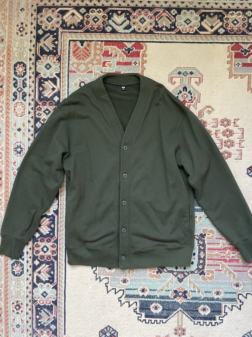 Uniqlo Sweat Cardigan (Category: Coats, Jackets and Outerwear) located in Pasig City. Submitted by erzvgo (Listing ID 1469633880, Image 1). Description: Uniqlo green sweat cardigan in olive green Size large Excellent condition V-neck cut with five matching buttons down the front. Ribbed cuffs and bottom hem. Buyer handles delivery from Makati .