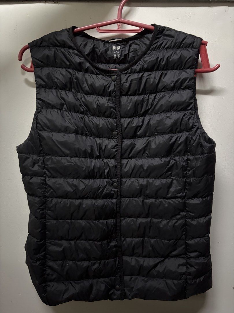 Uniqlo Puffer Vest (Category: Vests) located in Manila. Submitted by serra_shop (Listing ID 1469678938, Image 2). Description: UNIQLO DOWN VEST SIZE: MEDIUM Shell: 100% nylon Filling: 90% down, 10% feathers Lining: 100% nylon Size: M (bust 80–86 cm) Courier: J&T Location: Pampanga .