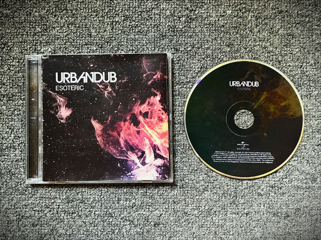 URBANDUB (2013) Esoteric CD (Category: CDs & DVDs) located in Cebu City. Submitted by lighterrecords (Listing ID 1469695924, Image 1). Description: Calling all Dubistas and OPM rock collectors! Letting go of a crucial piece of local rock history from my personal archive. This is the original physical CD release of Esoteric (2013, MCA Music), the sixth and final studio album released by the Giant Sound of the South before their hiatus. Finding ori