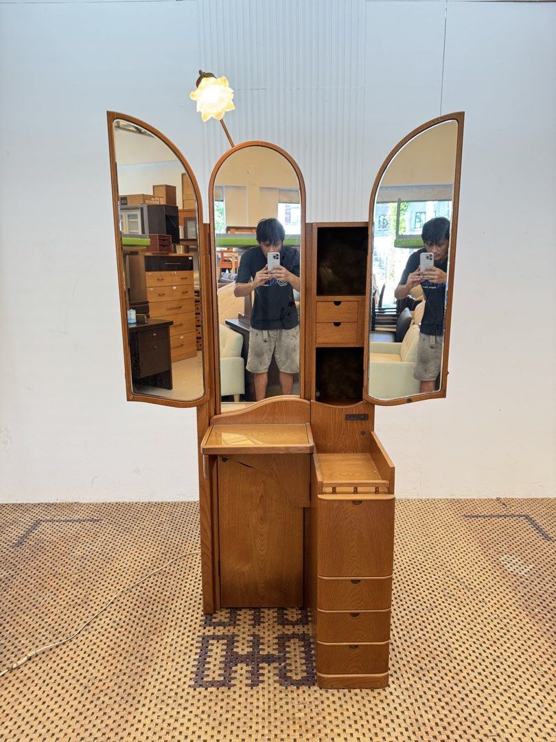 Vanity Dresser (Category: Tables & Sets) located in Quezon City. Submitted by matetdevis13 (Listing ID 1469614441, Image 3). Description: Vintage Wooden Tri-Fold Vanity Dressing Table with Flower Accent Light & Storage Price: 8,900 L41.5/24.5 x W19.5 x H67/29 In good condition Code JMD30-M76 The most distinctive feature is the three-panel folding mirror—the two side mirrors close over the center section when not in use..