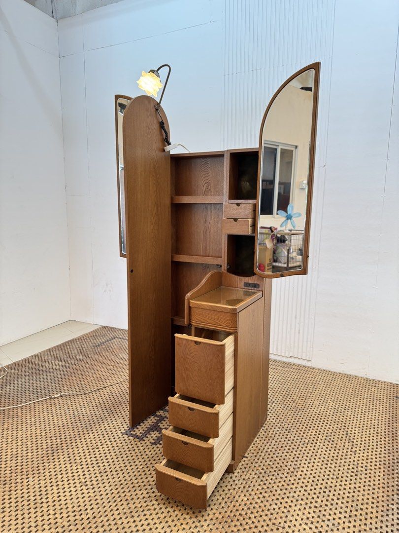 Vanity Dresser (Category: Tables & Sets) located in Quezon City. Submitted by matetdevis13 (Listing ID 1469614441, Image 2). Description: Vintage Wooden Tri-Fold Vanity Dressing Table with Flower Accent Light & Storage Price: 8,900 L41.5/24.5 x W19.5 x H67/29 In good condition Code JMD30-M76 The most distinctive feature is the three-panel folding mirror—the two side mirrors close over the center section when not in use..