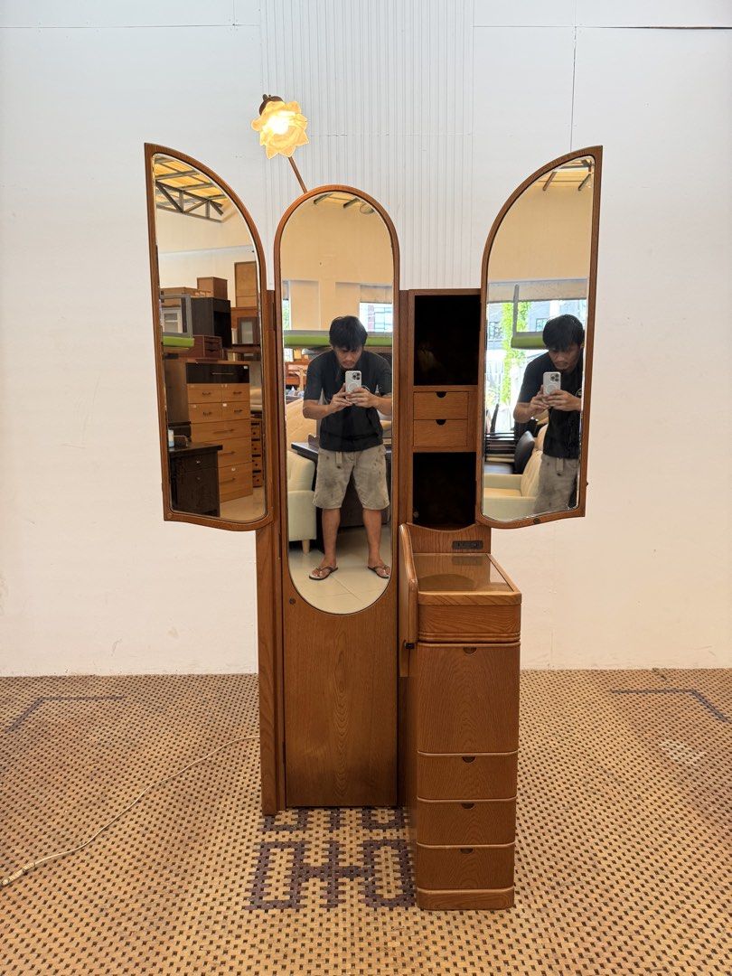 Vanity Dresser (Category: Tables & Sets) located in Quezon City. Submitted by matetdevis13 (Listing ID 1469614441, Image 1). Description: Vintage Wooden Tri-Fold Vanity Dressing Table with Flower Accent Light & Storage Price: 8,900 L41.5/24.5 x W19.5 x H67/29 In good condition Code JMD30-M76 The most distinctive feature is the three-panel folding mirror—the two side mirrors close over the center section when not in use..